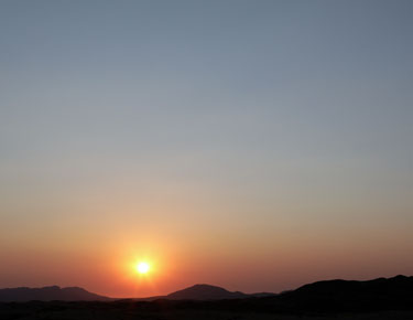 sonnenuntergang auf rooiklip, namibia